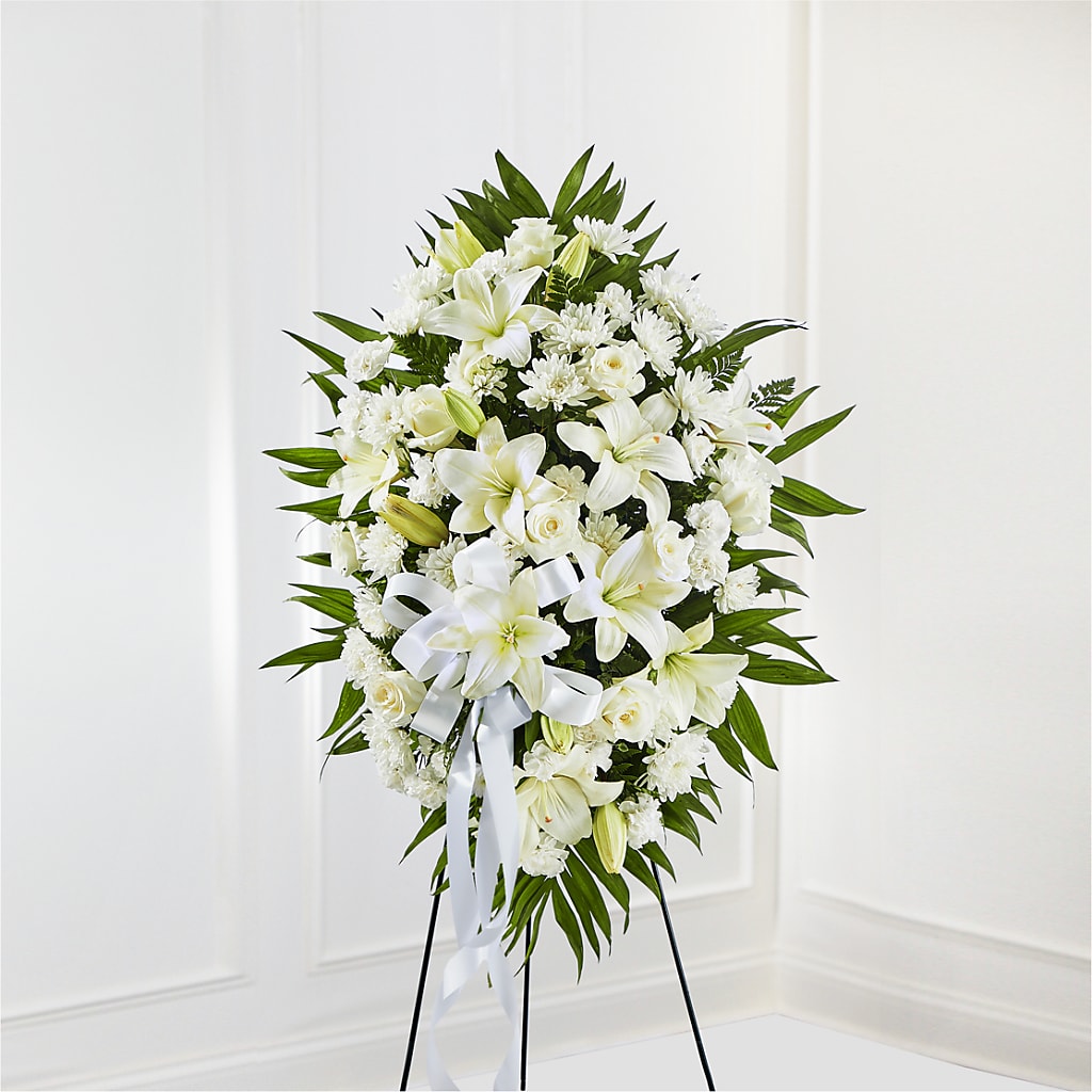 Exquisite Tribute Standing Spray-White Ribbon – Freesia Flowers, Tomball TX
