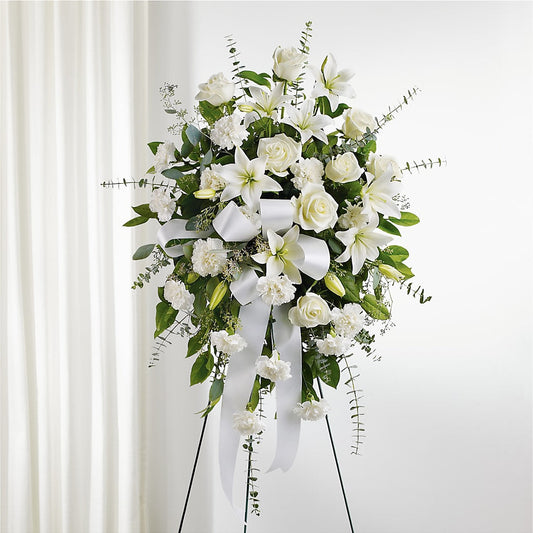 With Care Standing Spray –  Freesia Flowers, Tomball TX