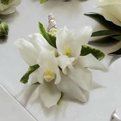 White Mini Cymbidium Boutonniere –  Freesia Flowers, Tomball TX